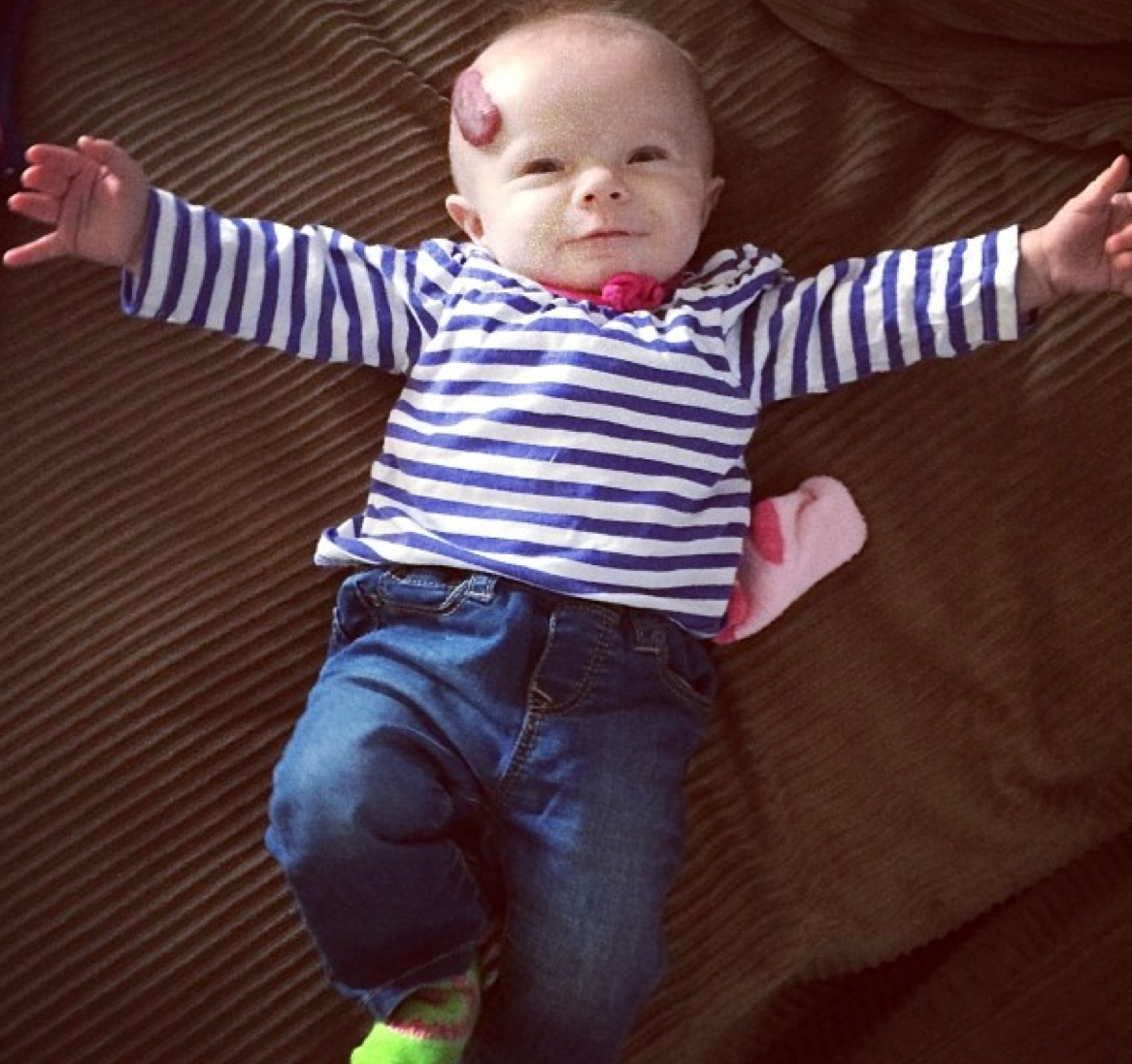 babies wearing jeans